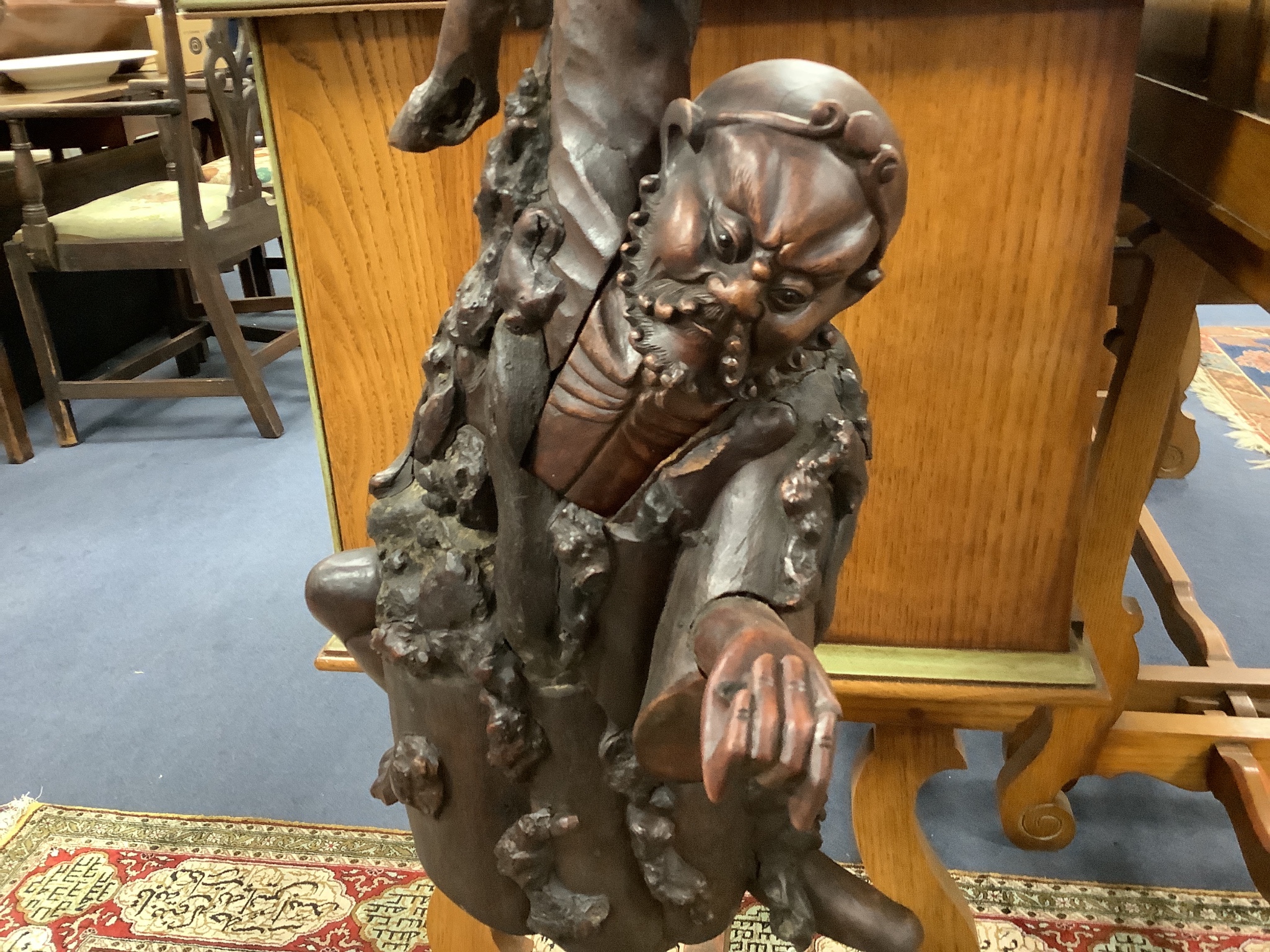 A large rosewood carving, height 110cm Dan report